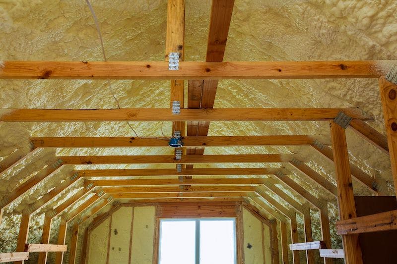 attic insulation with wooden beams